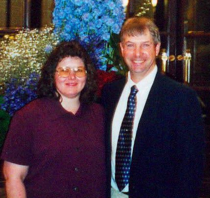 Gina and her husband in Paris